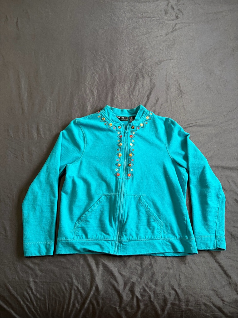 Onque Casuals whimsical fairy teal embroidered zip up. Size M.